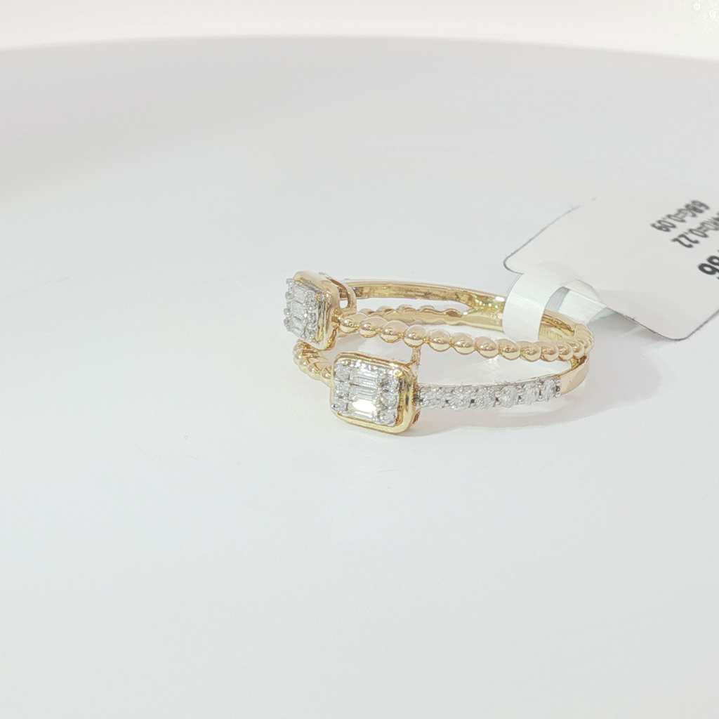 Double emerald diamond ring