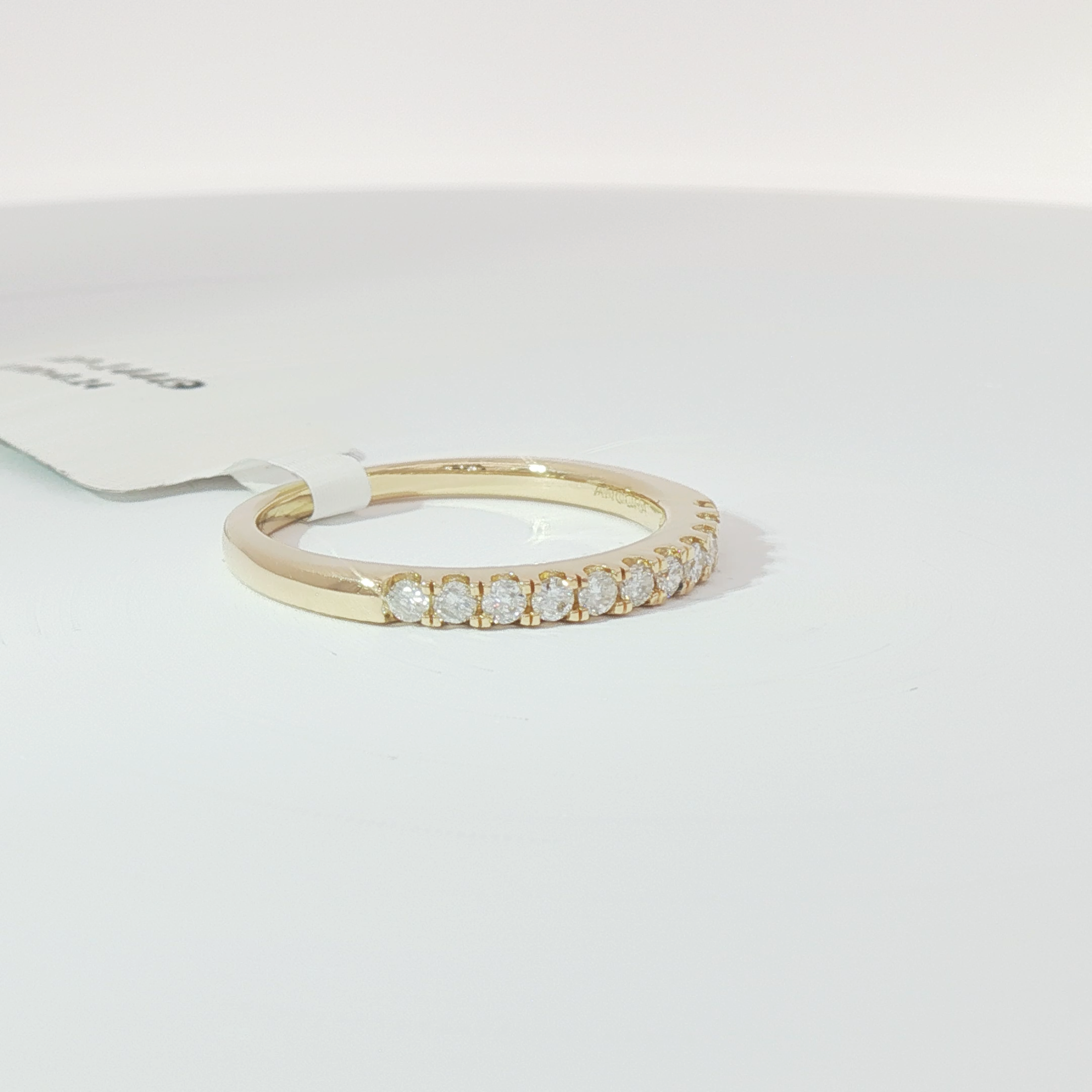 Single row diamond band
