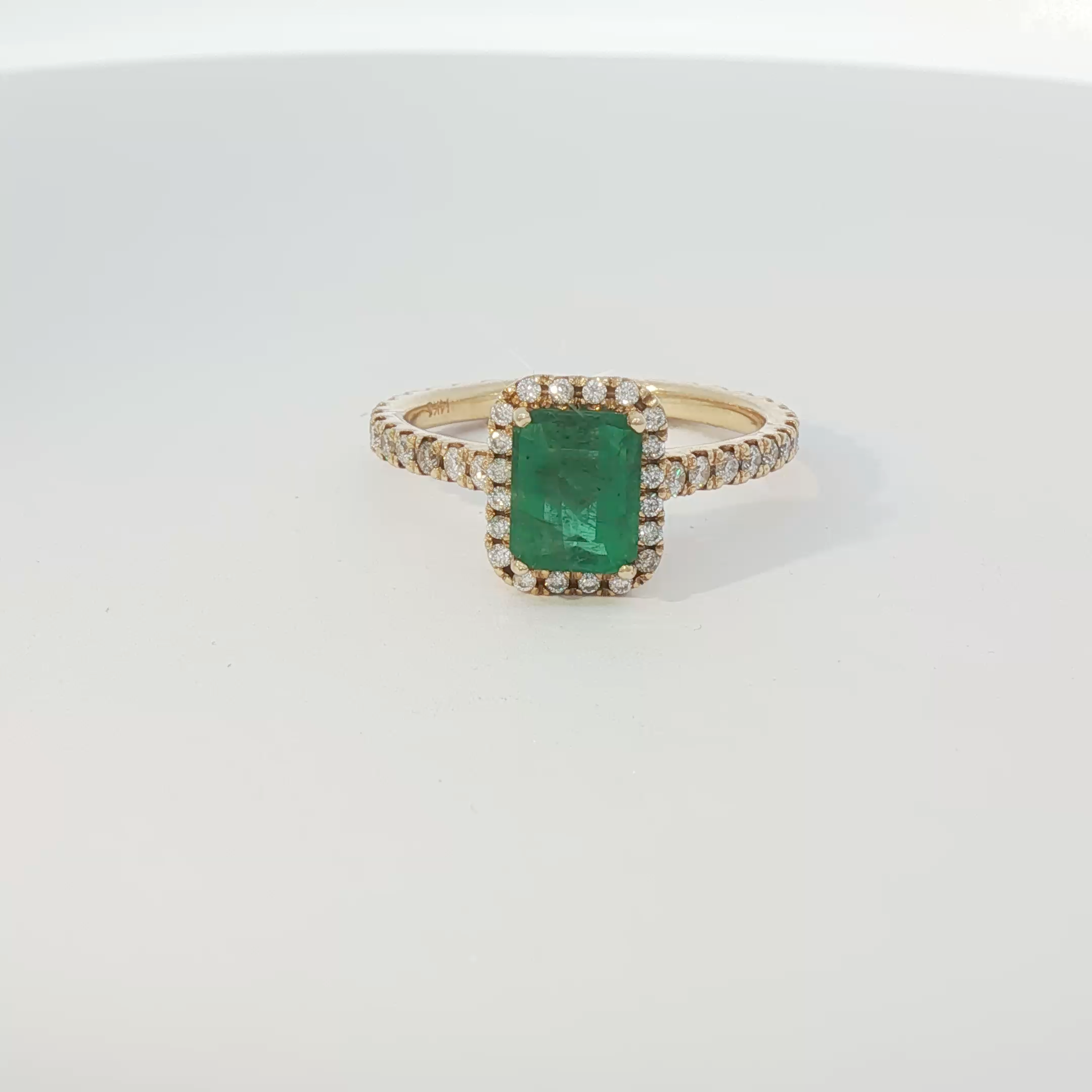 Emerald halo ring