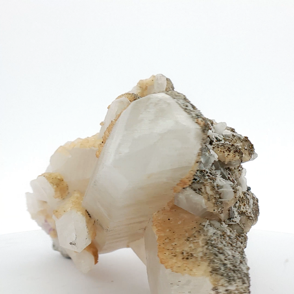 Pyrite & calcite on quartz