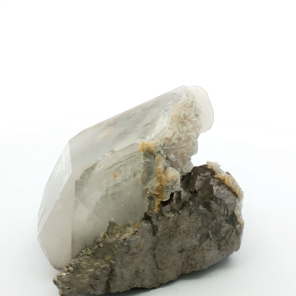 Quartz, calcite on arsenopyrite