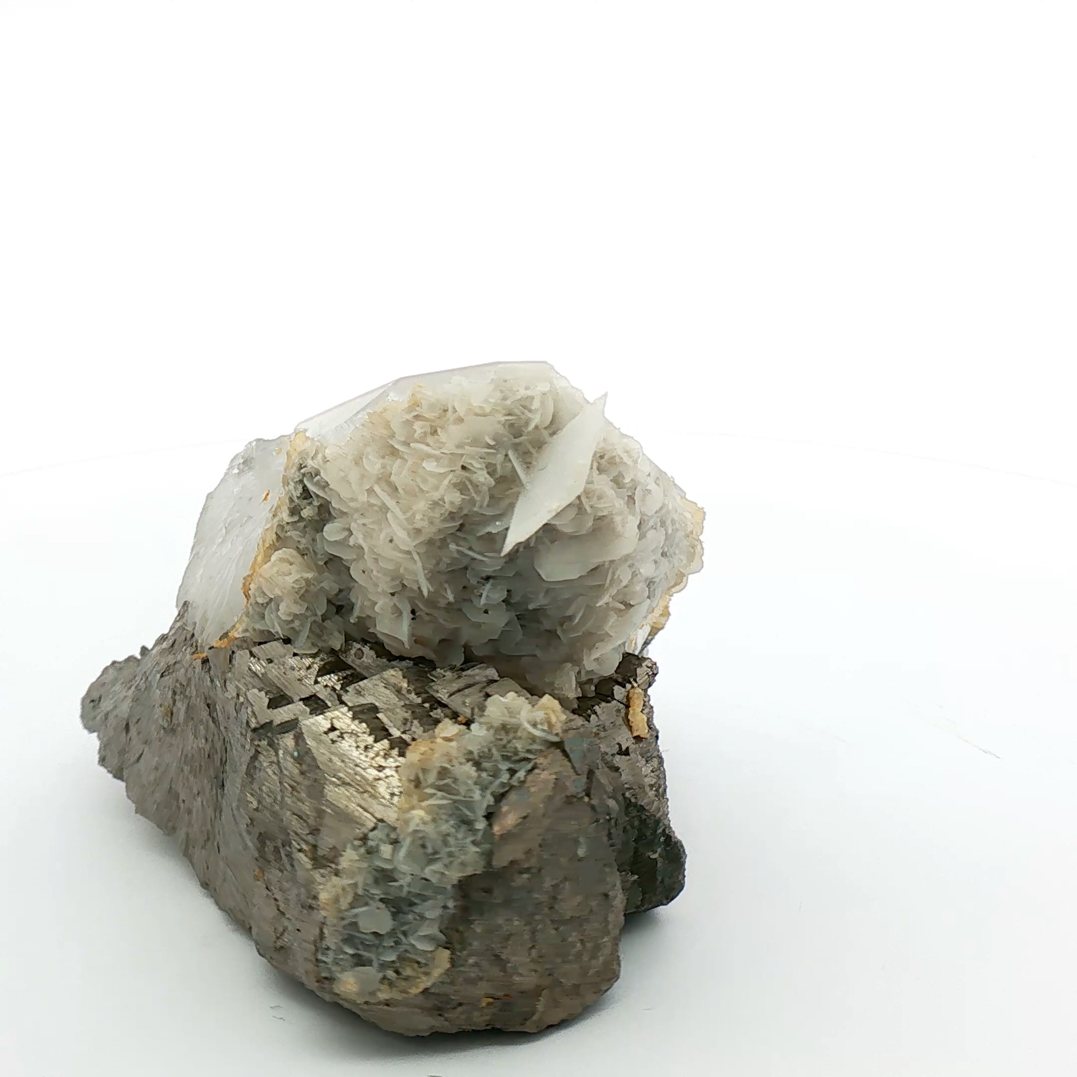 Quartz, calcite on arsenopyrite