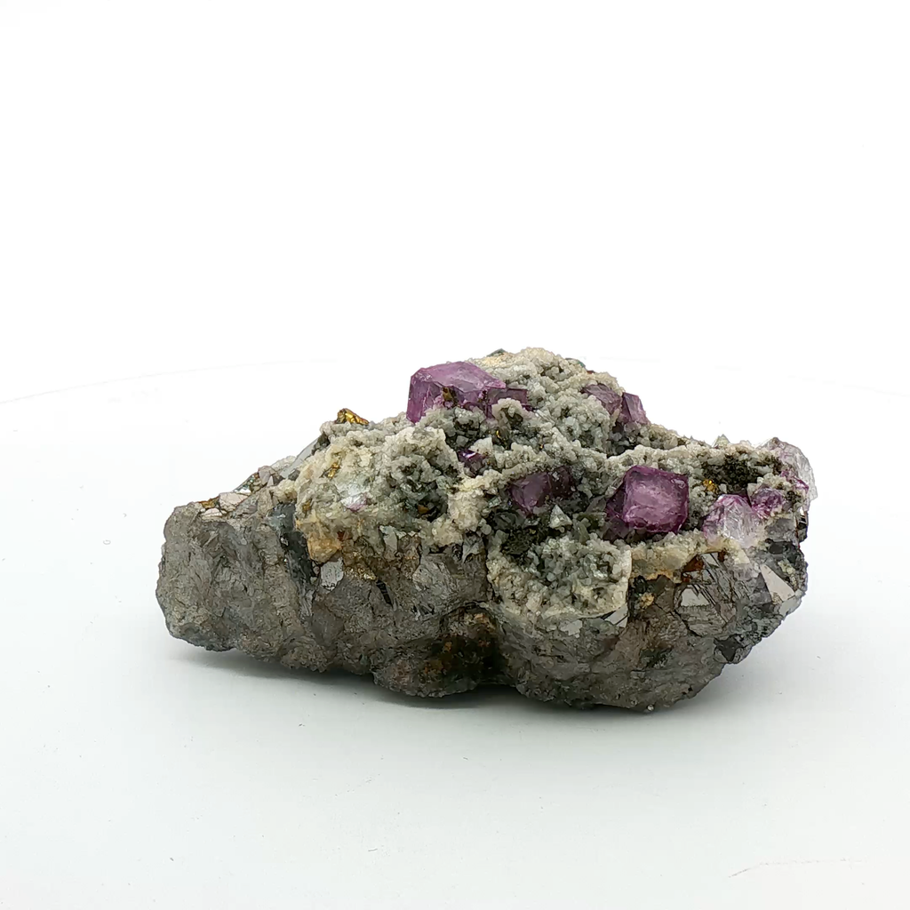 Fluorite, calcite on arsenopyrite