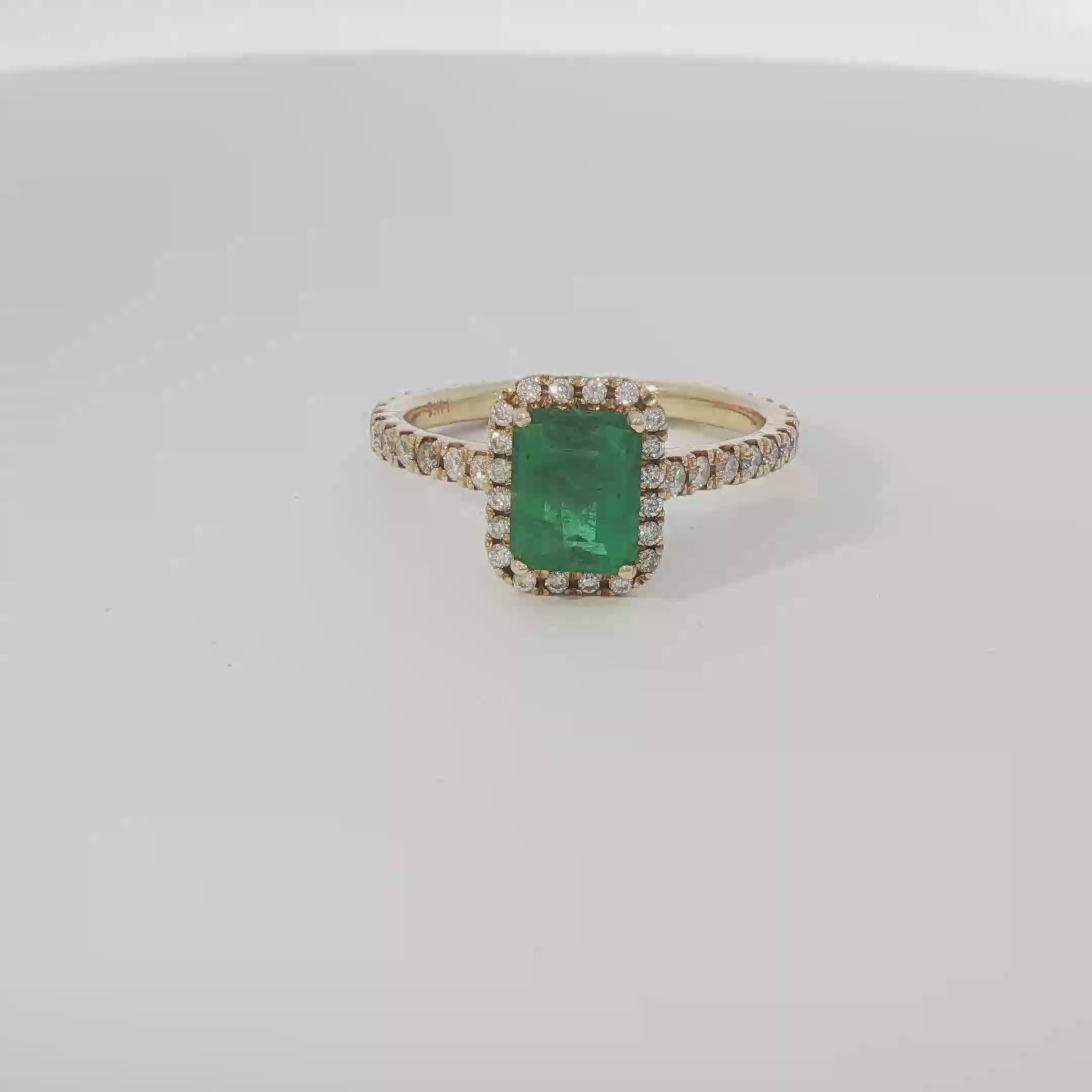 Emerald halo ring