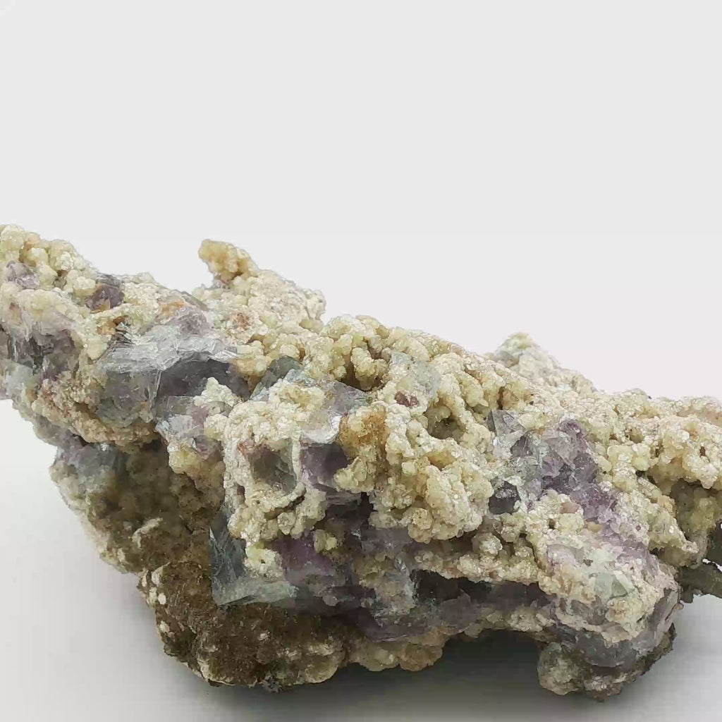 Fluorite, calcite on quartz