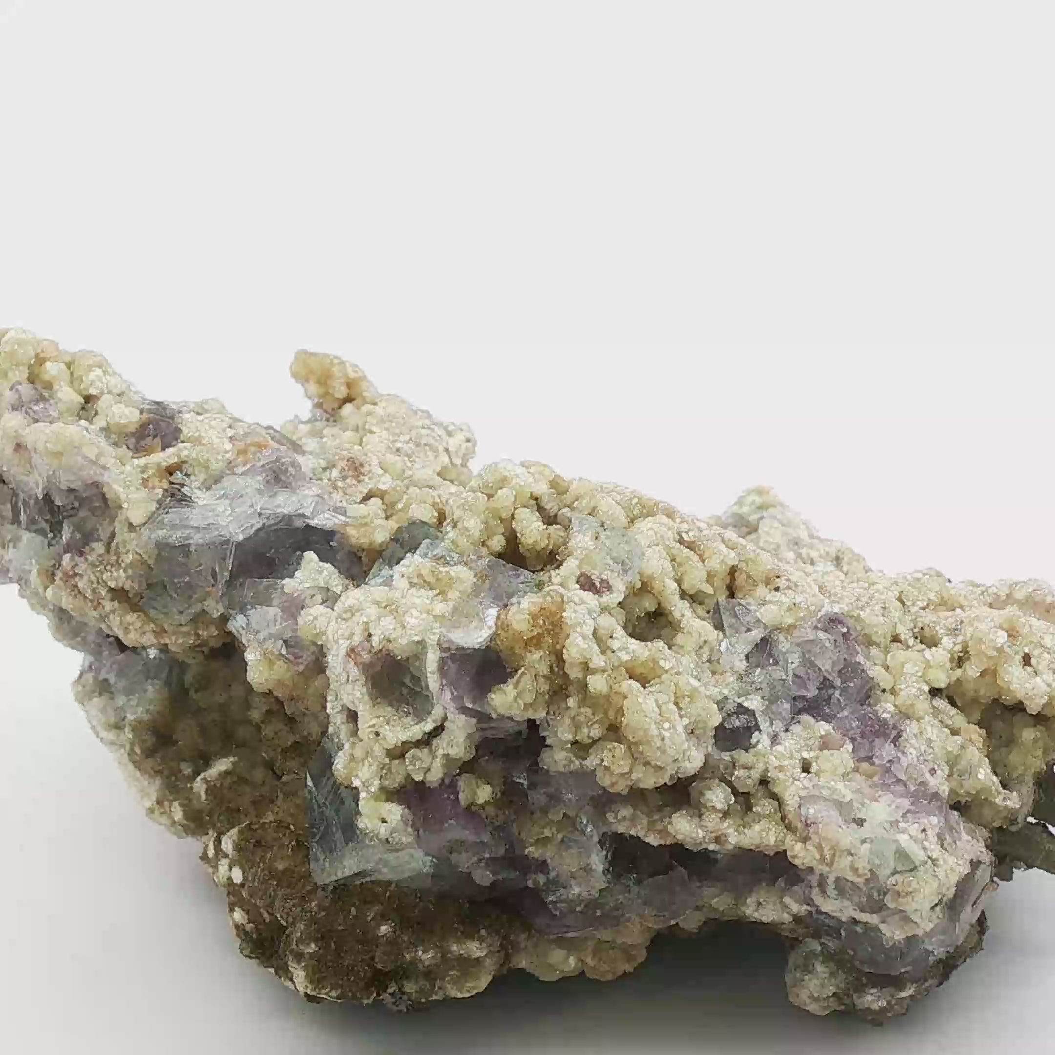 Fluorite, calcite on quartz