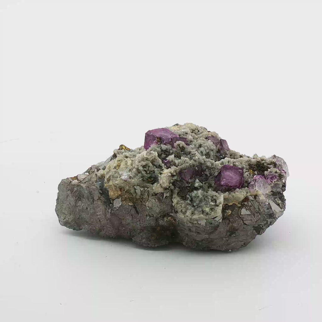 Fluorite, calcite on arsenopyrite
